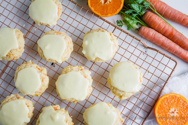 iced carrot cookies recipe - Such an easy carrot cookies recipe with orange glaze frosting. This zesty orange glaze for carrot cookies are the perfect topping for our light and fluffy carrot cookies!
