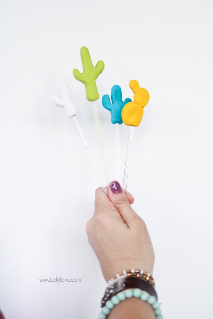 Cute DIY Cactus Drink Stirrer Stick tutorial. Grab this yummy Berry Prickly Pear recipe too! Great summer drink recipe! Love this cactus party decor!!