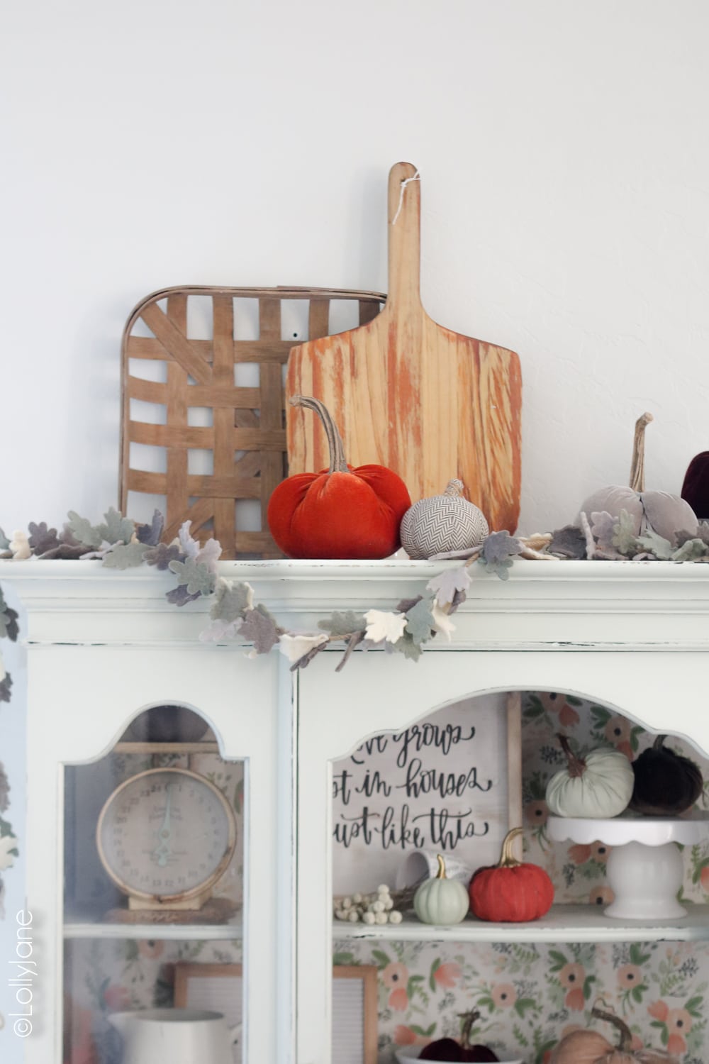 Add garland and plush pumpkins to your hutch, cabinet, or buffet for instant autumn warmth! Click to see 5 other fall homes decked out for fall!