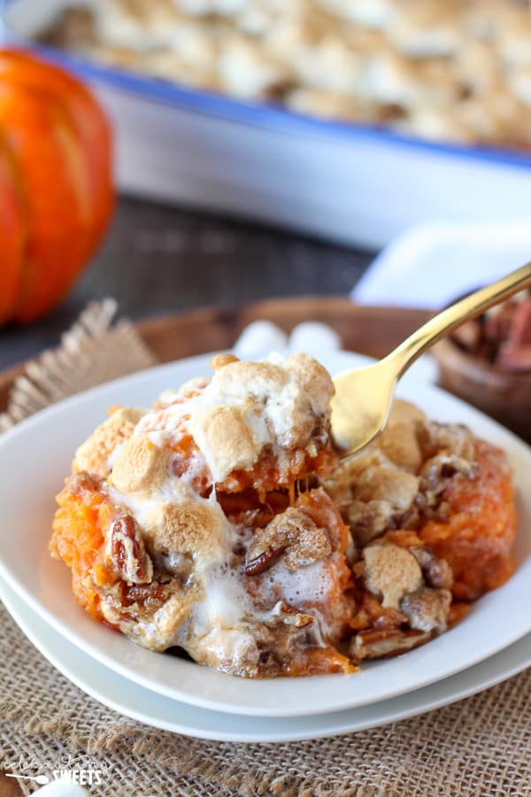 Sweet Potato Casserole with Marshmallows and Pecan Streusel - Mashed sweet potato casserole topped with toasted marshmallows and a brown sugar cinnamon pecan streusel. The perfect side dish for Thanksgiving or any other holiday celebration.