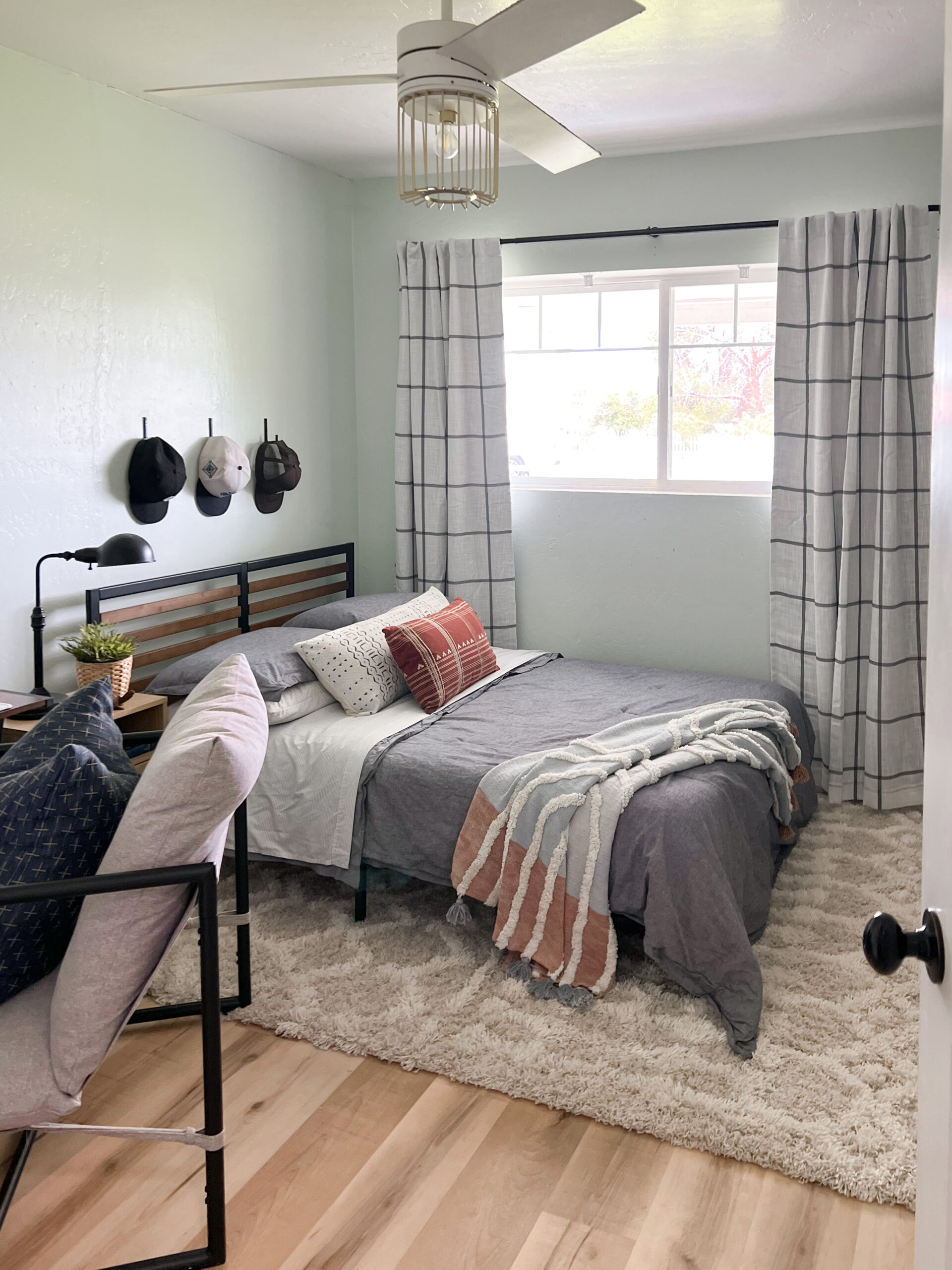 Teen boy bedroom decorations for the special gamer in your life! Lots of affordable Amazon bedroom decor, an Amazon plush rug, Target blackout curtains and the coziest mattress you've ever slept on!