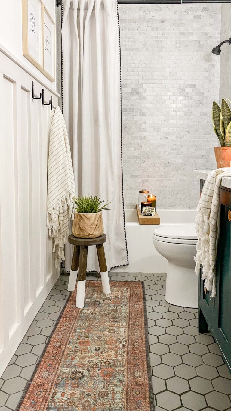 Add instant texture and cozy to an otherwise flat or boring wall in less than a day with our easy DIY Board + Batten Accent Wall tutorial! #boardandbatten #boardbatten #diy #accentwall #woodoworking