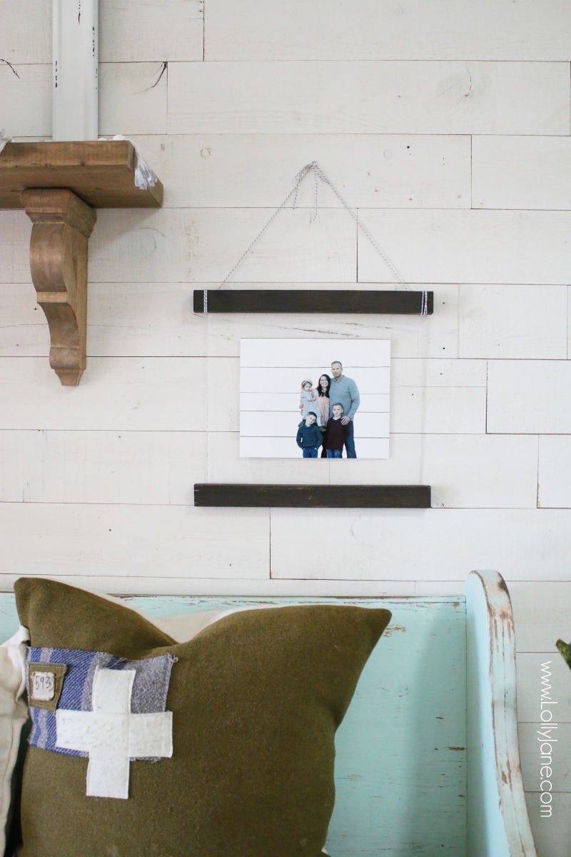 How to make a wood scroll, such a fun wood scroll tutorial! Cute family picture wall decor idea! #diy #shiplap #woodscroll #walldecor #pictureframetutorial