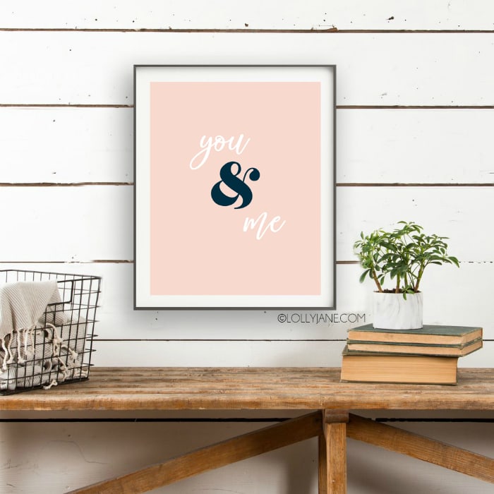 You and Me printable art! Love this simple Valentines Day print for an easy wall treatment! Looking for easy Valentines Day decorations? Save and print this pink you and me Valentine's Day printable art! #valentinesdaydecor #loveprint #allyouneedislove #allyouneedisloveprint #printableart #vdayart