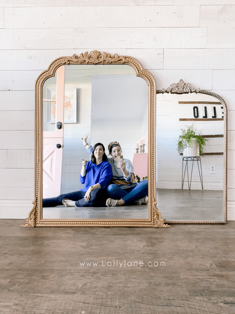 Turn any mirror into a gold ornate Anthro knock off with a few appliques and a gold can of spray paint. Love this easy Anthro mirror dupe! #anthrodupe #cheapAnthromirror #goldmirrordiy #howtospraypaintgoldmirror #anthroknockoffmirror #anthrocopycatmirror